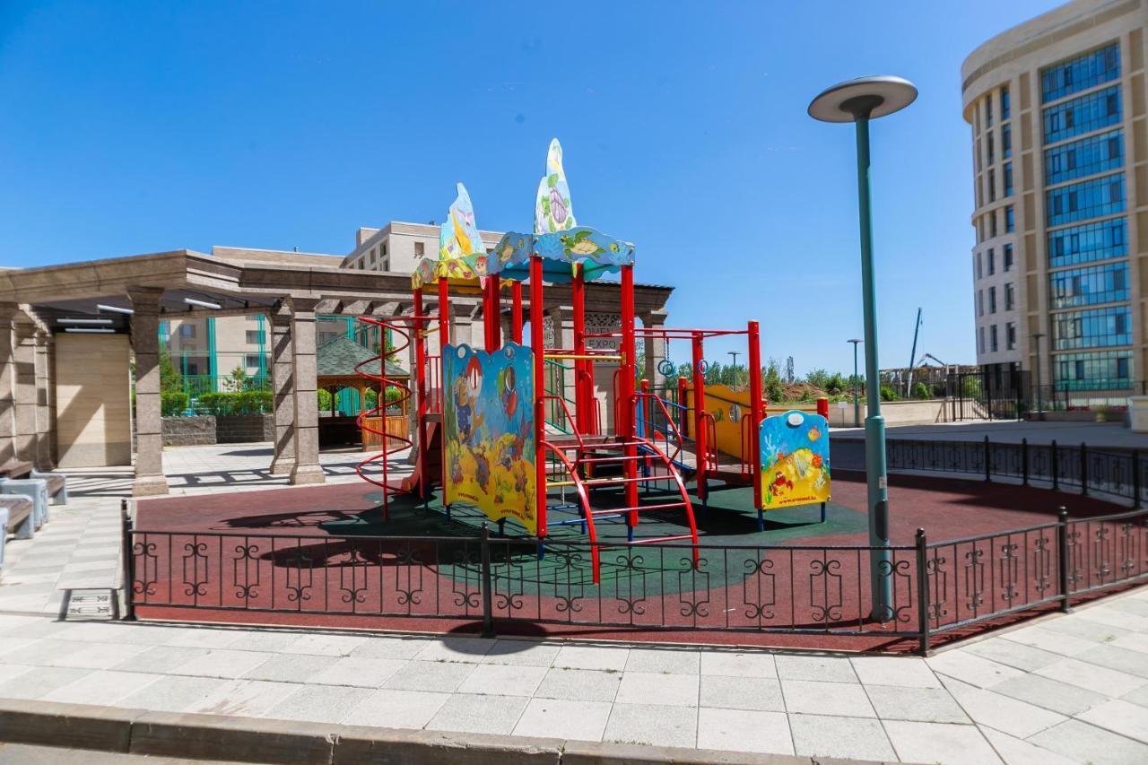 В Promenade Expo квартира с романтическим видом Астана Экстерьер фото